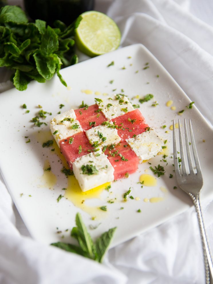 Watermelon and Feta Salad cubes with mint and fork