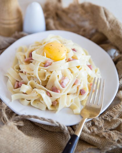 Fettuccine Carbonara No Cream with raw egg on top