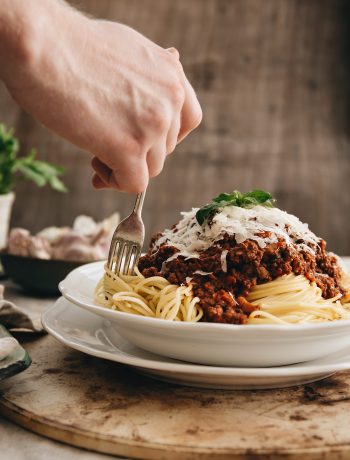 The Best Spaghetti Bolognese Recipe - Twisting Spaghetti with Fork