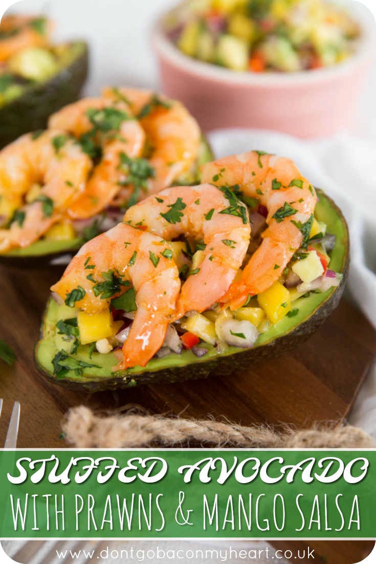 The flavours in these Stuffed Avocado with Prawns and Mango Salsa are heavenly. The perfect low carb lunch which are SO quick and easy to whip up! #prawn #shrimp #avocado #mango | www.dontgobaconmyheart.co.uk