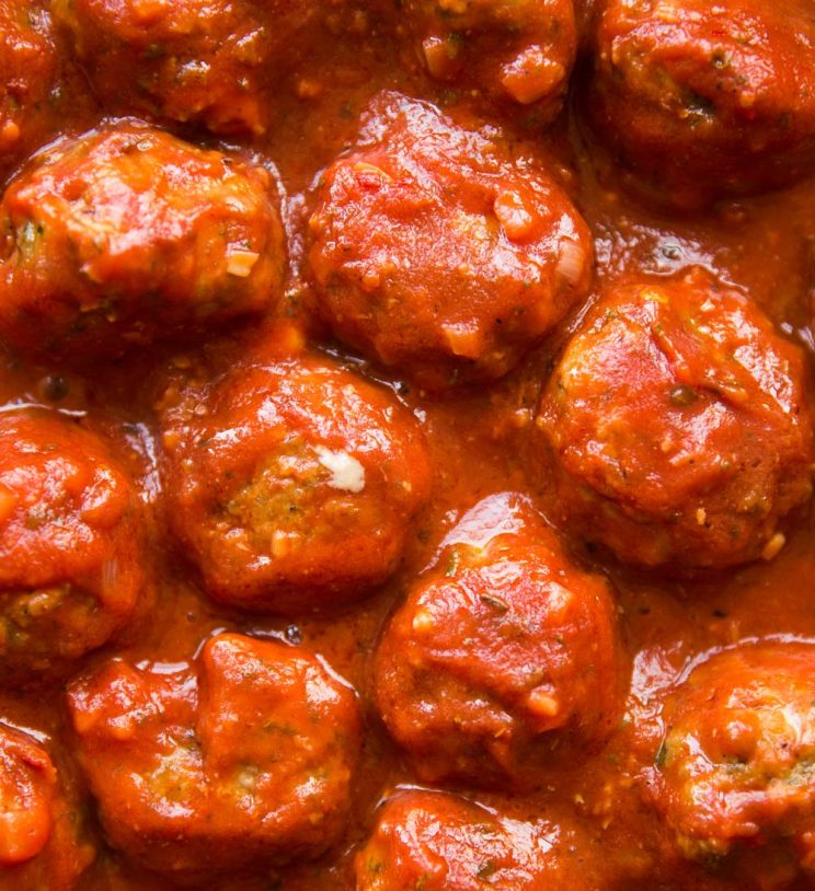 overhead close up shot of meatballs in sauce in skillet