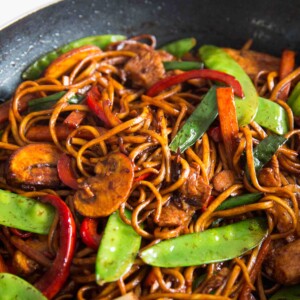 Chicken Noodle Stir Fry in the wok close up