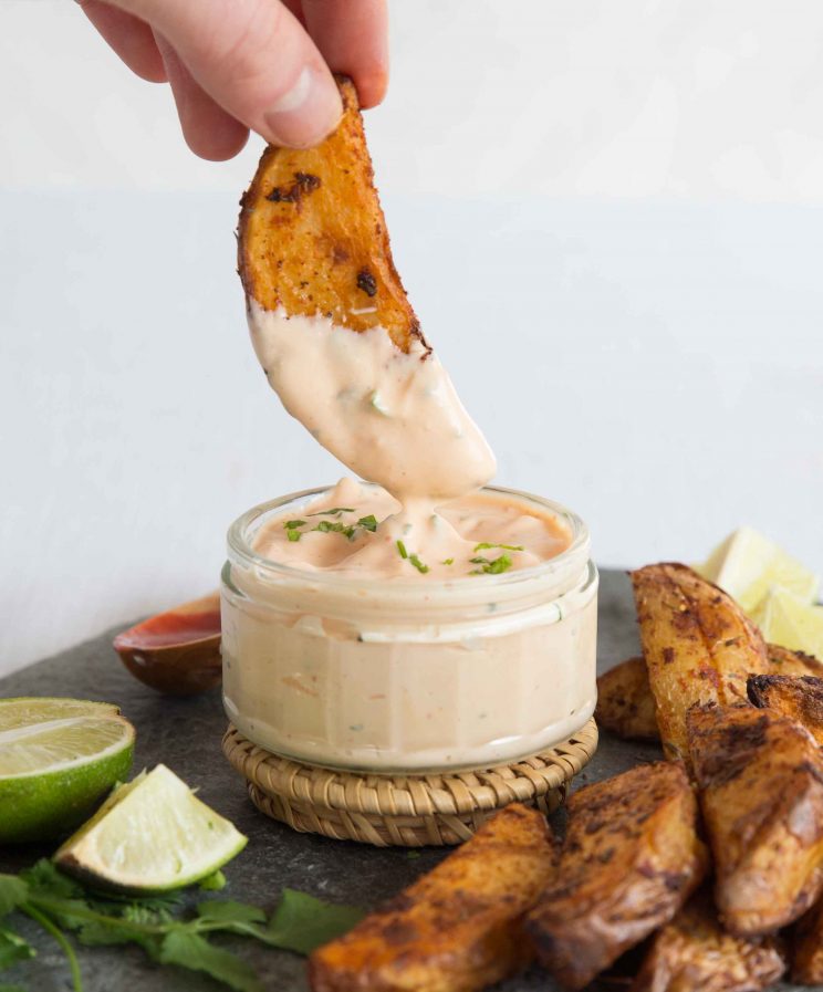 Sriracha Mayo with potato wedges dipping in