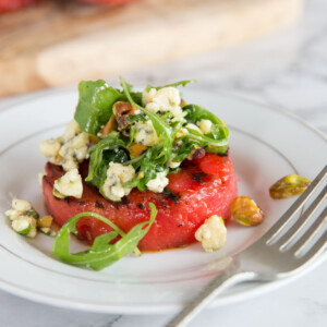 Grilled Watermelon Salad with arugula, blue cheese and pistachios
