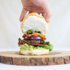 Mexican Cheeseburger with grilled peppers and open bun