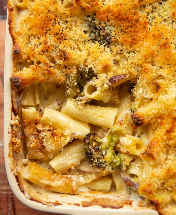 close up overhead shot of broccoli pasta bake fresh out the oven showing filling