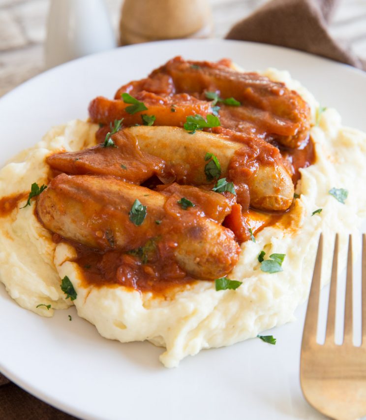 Devilled Sausages and Mashed Potato with parsley on top