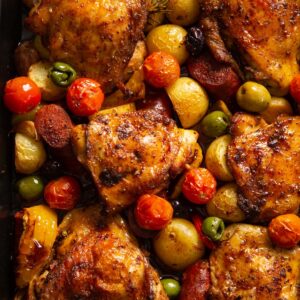 overhead shot of spanish chicken traybake fresh out of the oven