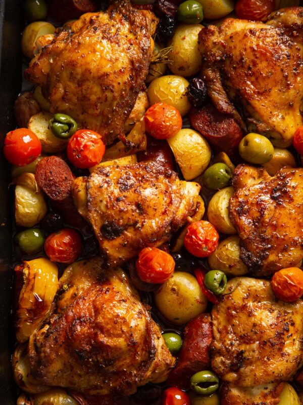 overhead shot of spanish chicken traybake fresh out of the oven