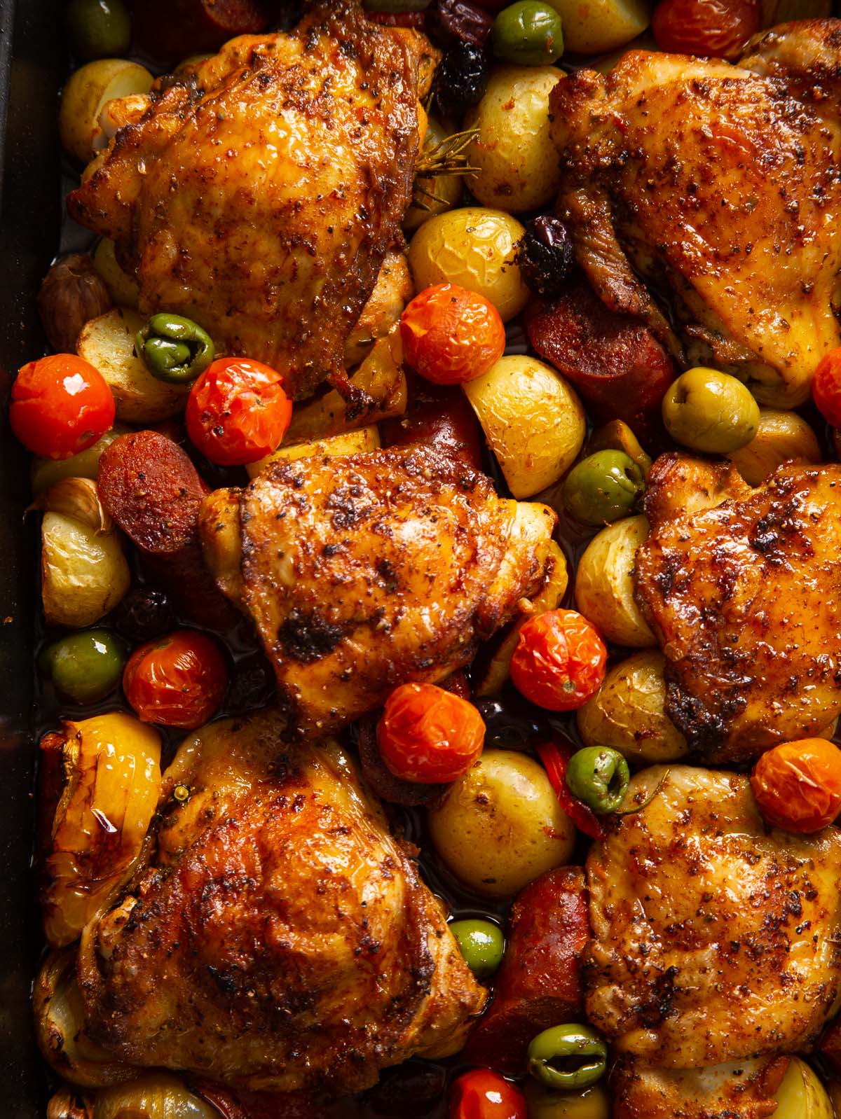 overhead shot of spanish chicken traybake fresh out of the oven