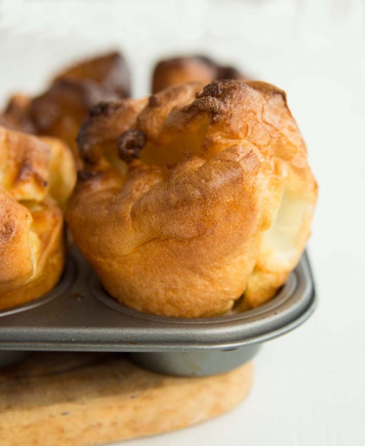 side angle shot of Perfect Yorkshire Puddings straight out the oven