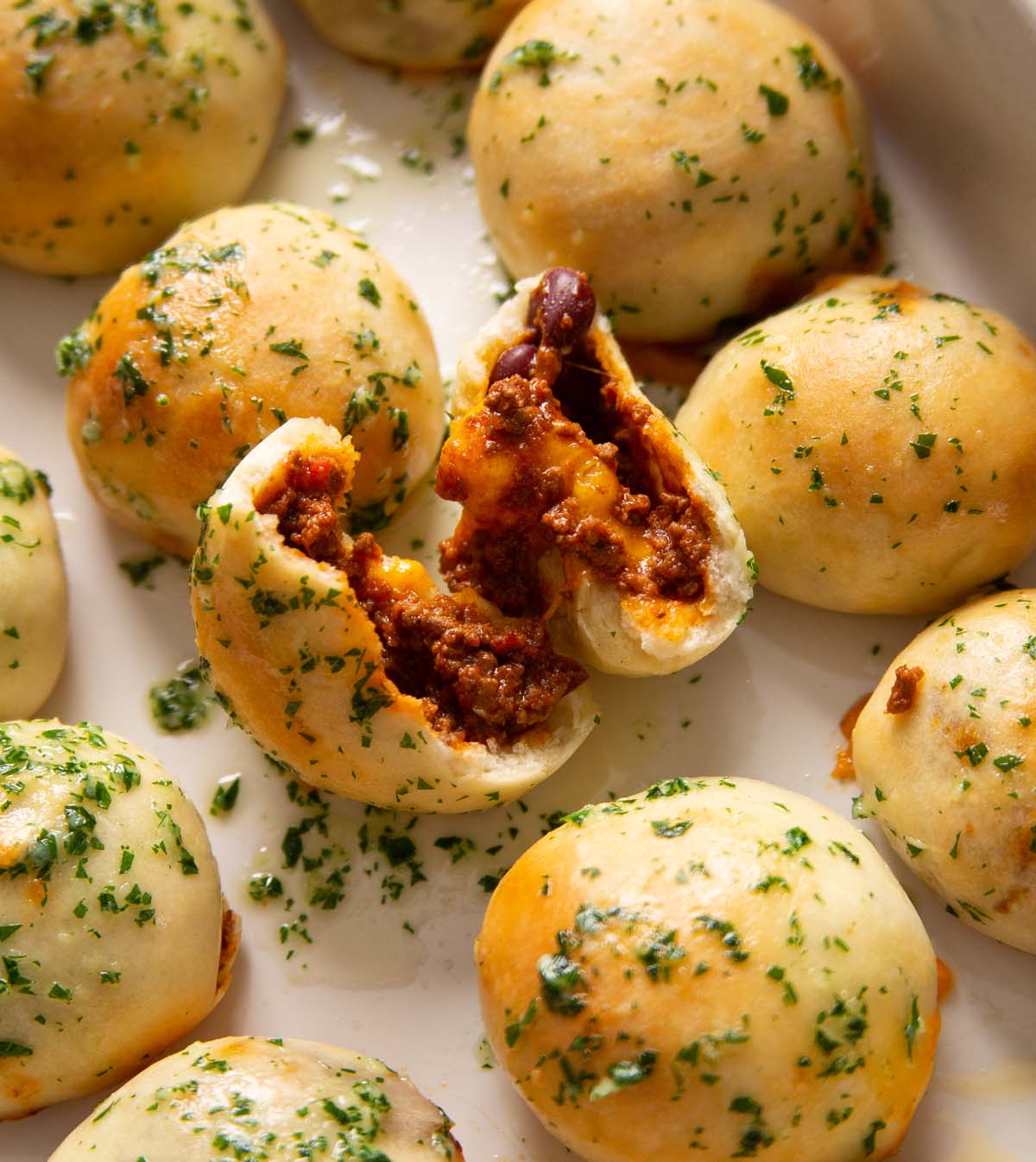 close up shot of leftover chilli dough ball split open to show filling