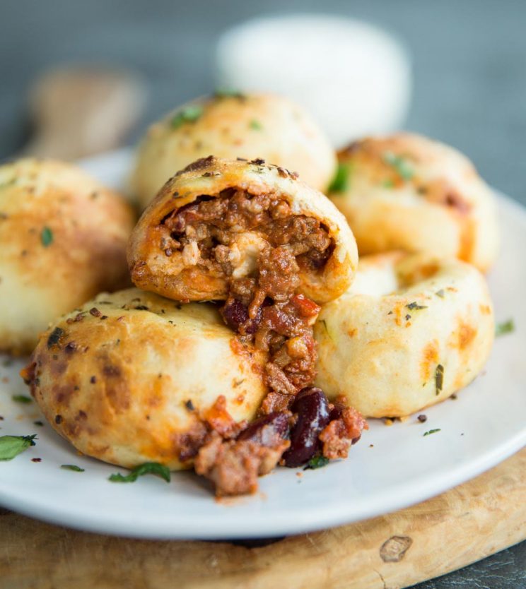 stuffed garlic dough balls with chilli pouring out