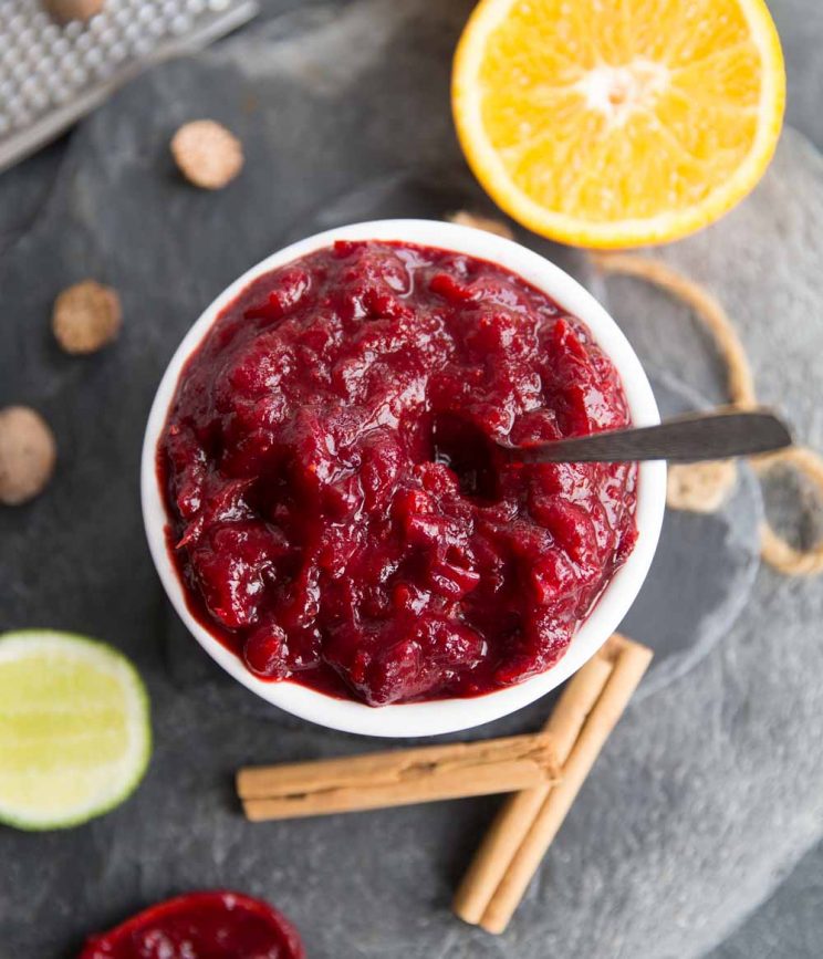 overhead shot of cranberry sauce with orange juice in a white bowl