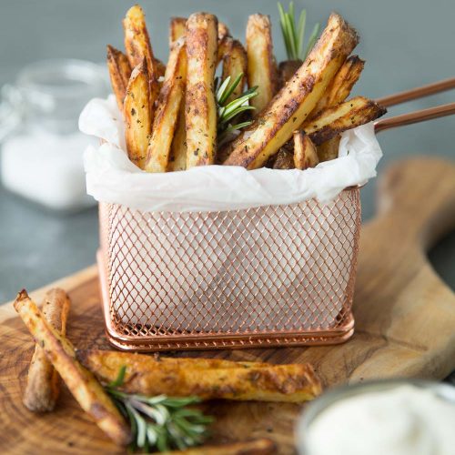 Crispy Oven Baked Fries with dip, fresh rosemary and sea salt