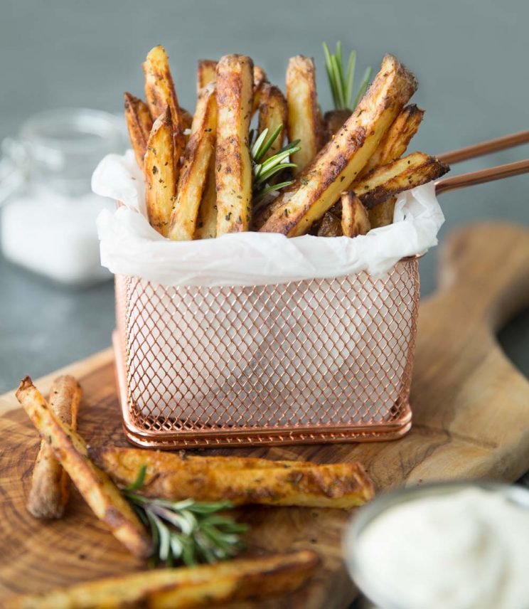 Crispy Oven Baked Fries with dip, fresh rosemary and sea salt