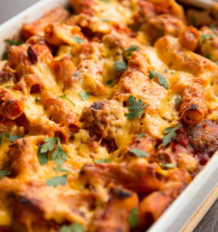 Meatball Pasta Bake fresh out the oven garnished with parsley