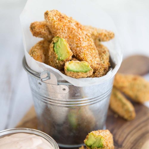 Homemade Avocado Fries in a small silver bucket with dip