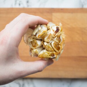 Closeup of roasted garlic fresh out the oven