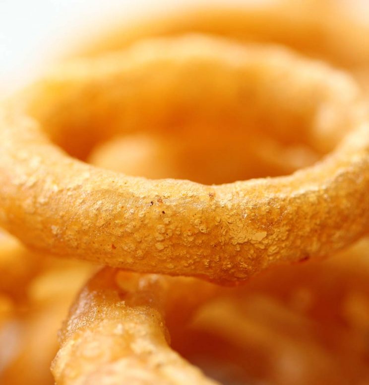 close up shot of air bubbles in onion ring