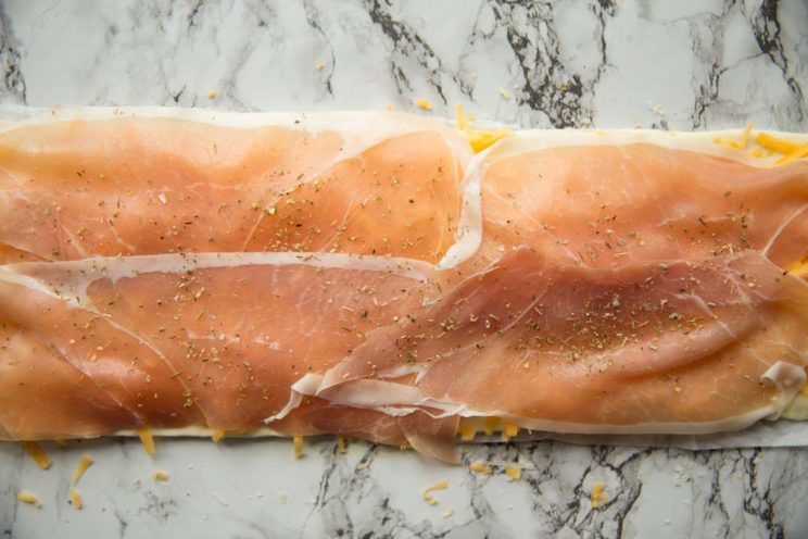 overhead shot of Cheese Prosciutto pinwheel - pre oven
