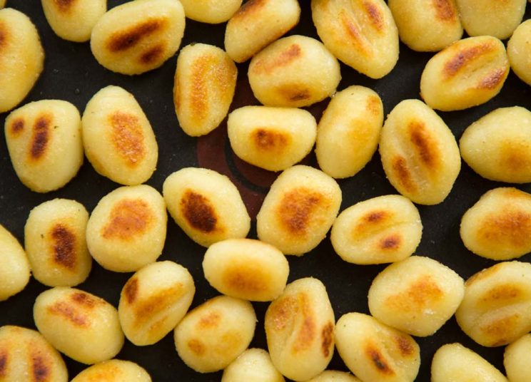 overhead shot of crispy gnocchi in a pan