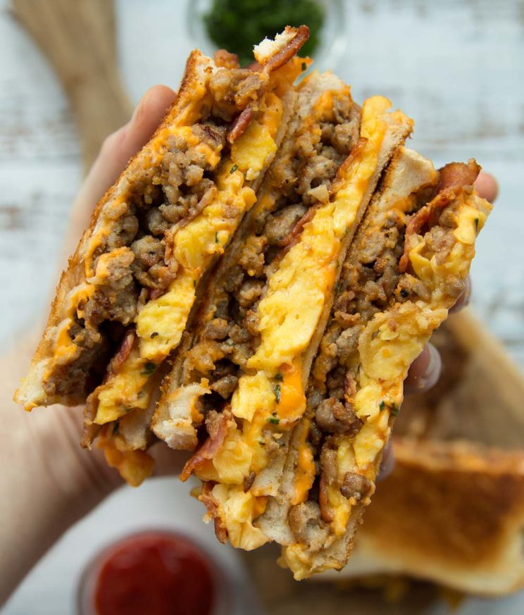 closeup on 3 grilled cheeses showing filling 