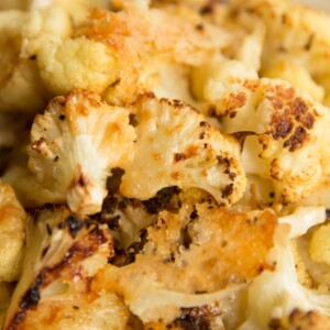 closeup shot of cheesy cauliflower fresh out the oven