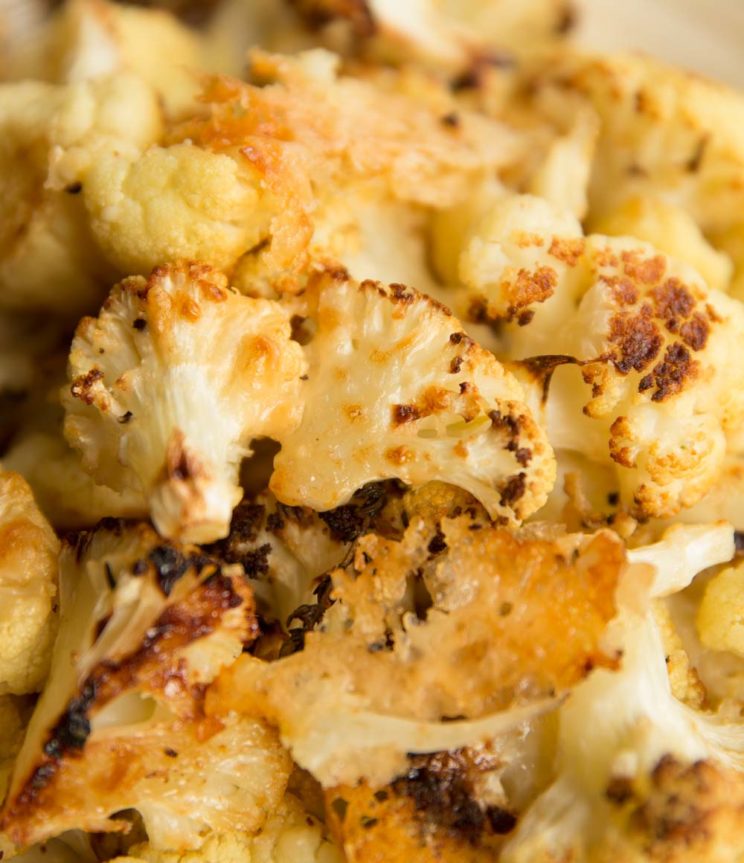 closeup shot of cheesy cauliflower fresh out the oven