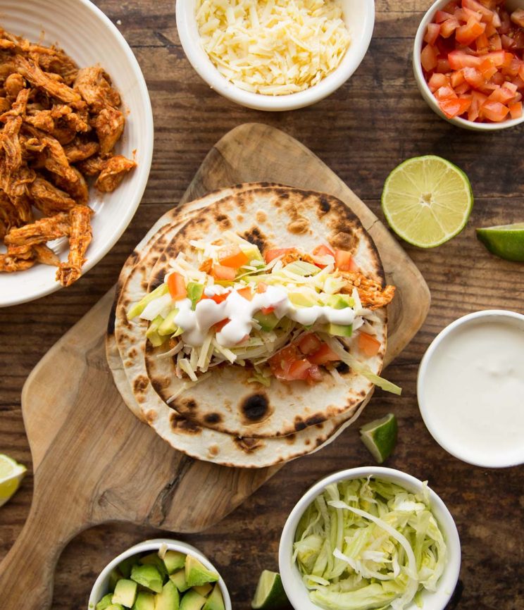 overhead shot of taco set up with ingredients spread around