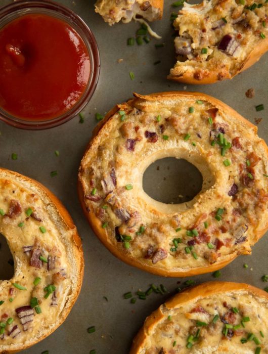 overhead shot of bagels with pot of ketchup
