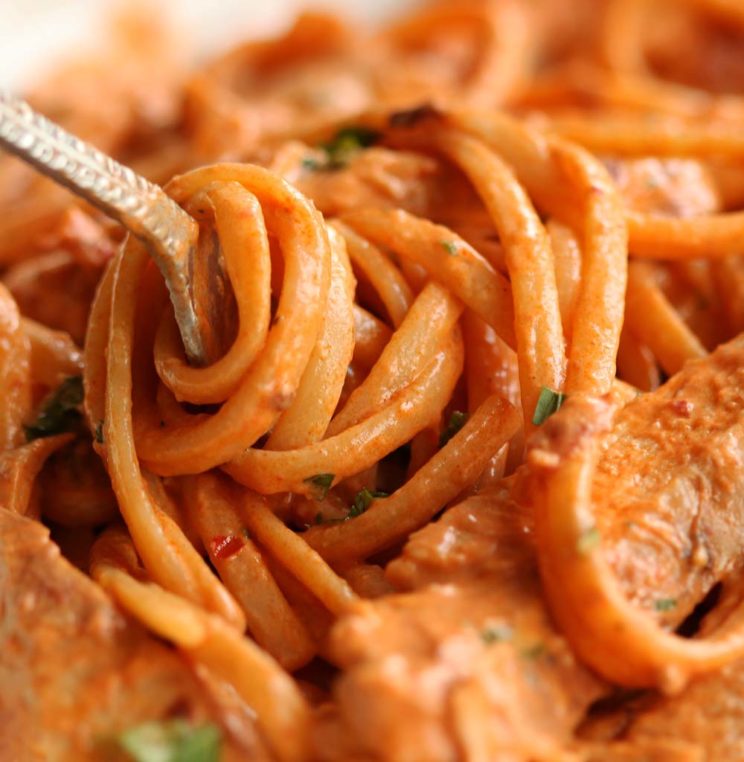 closeup shot of pasta twizzling around fork