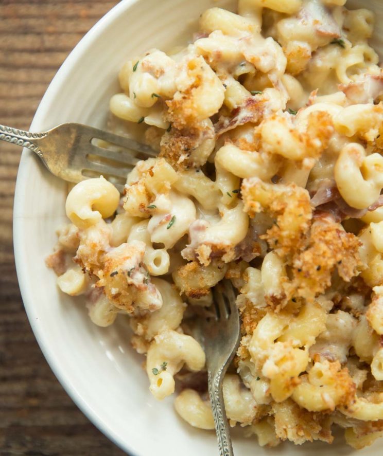 overhead shot of plated up brie mac and cheese with two forks digging in