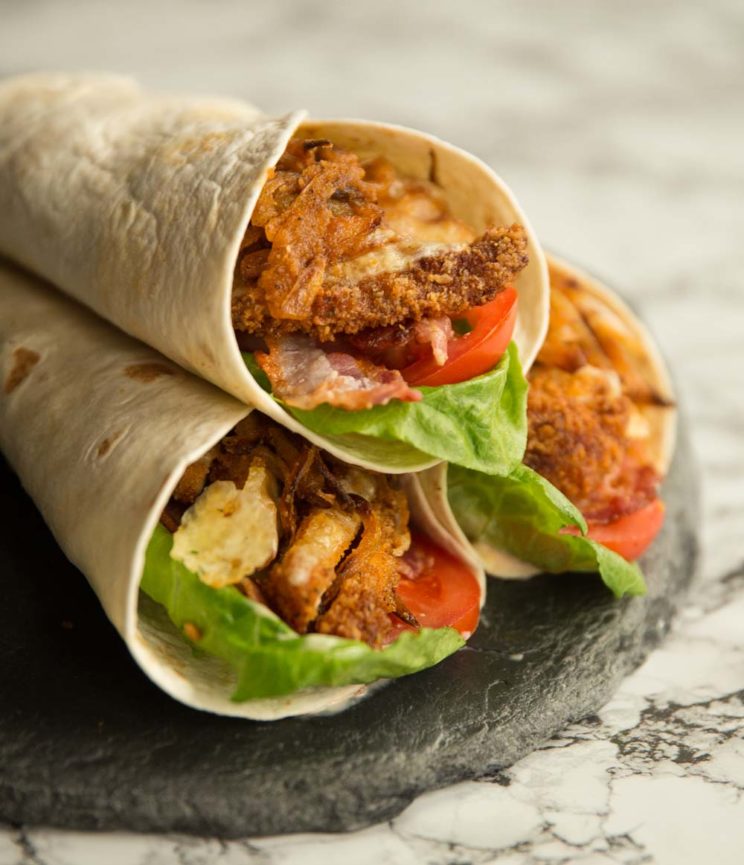 closeup shot of wraps, focus on crispy chicken