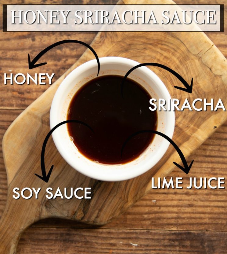 overhead shot of honey sriracha sauce in white pot with ingredients labels