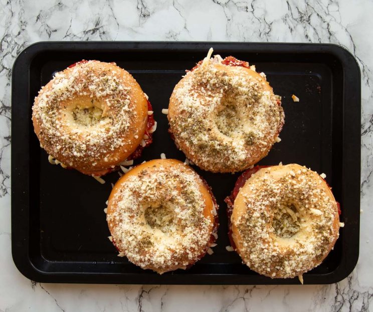 over head shot of bagels on baking tray ready to go in oven