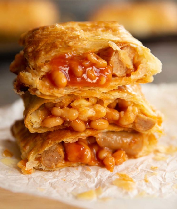 3 slices stacked on each other with beans spilling out