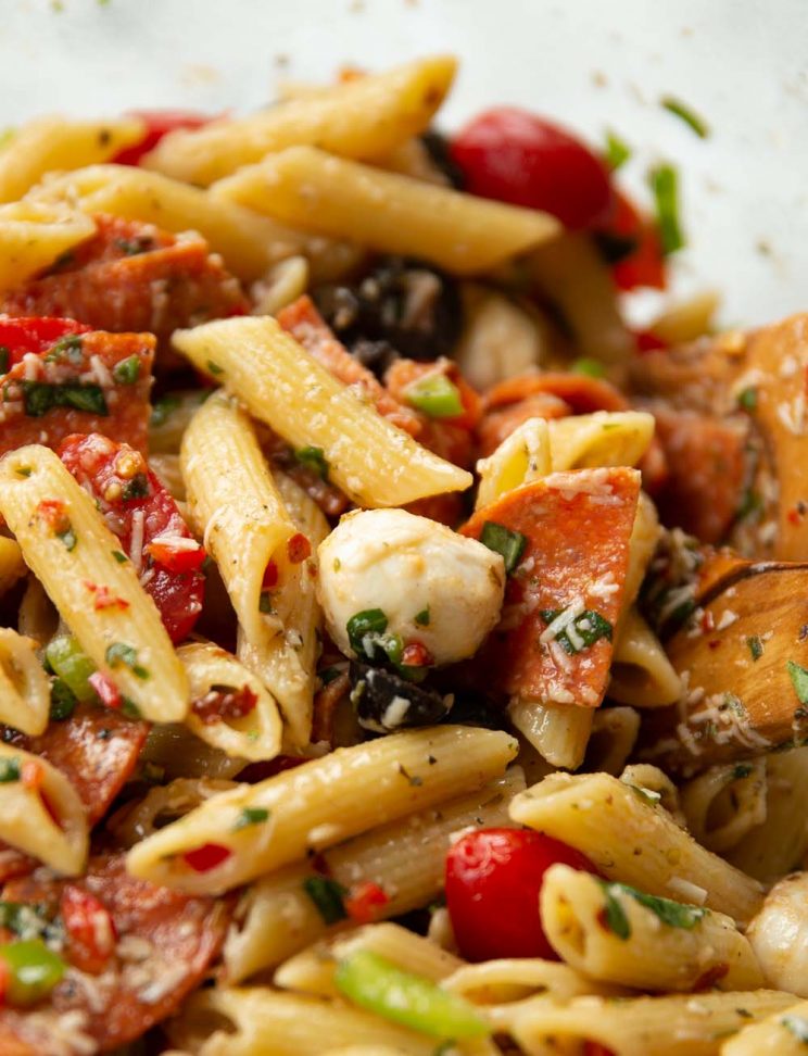 closeup shot of mozzarella ball in pasta salad