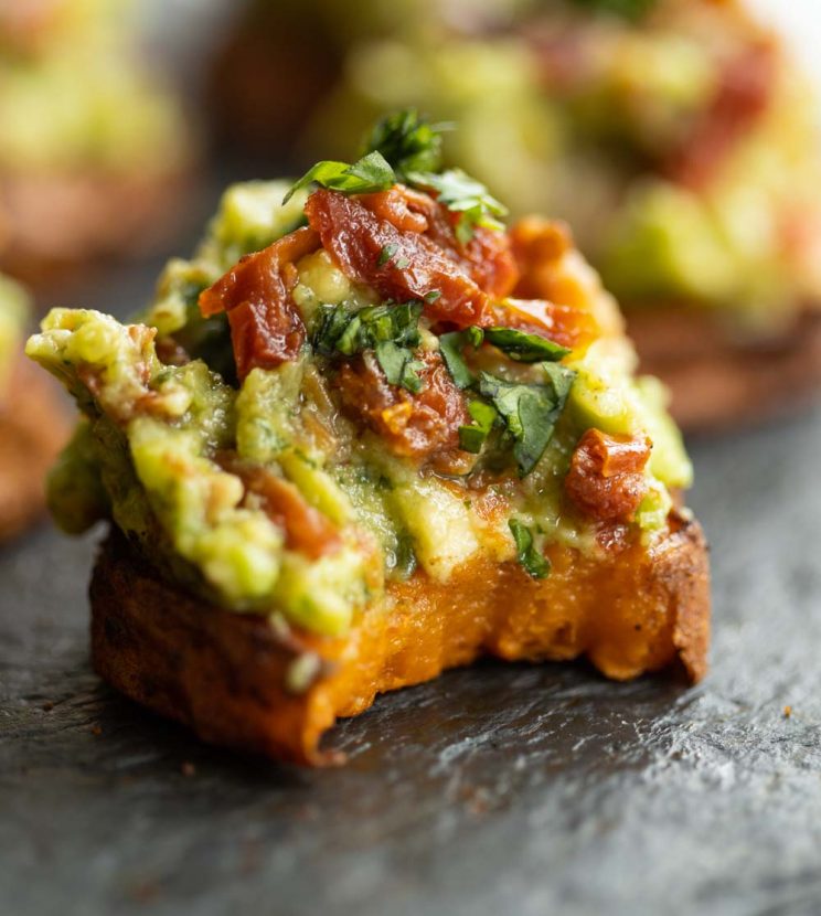 close up shot of sweet potato bite with bite mark in it