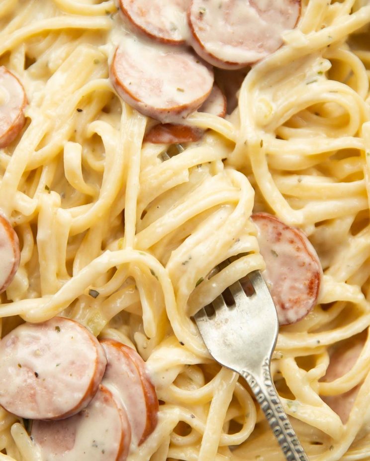 overhead shot of silver fork twizzling through pasta