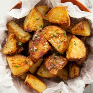 overhead shot of potatoes in scrunched up parchment paper