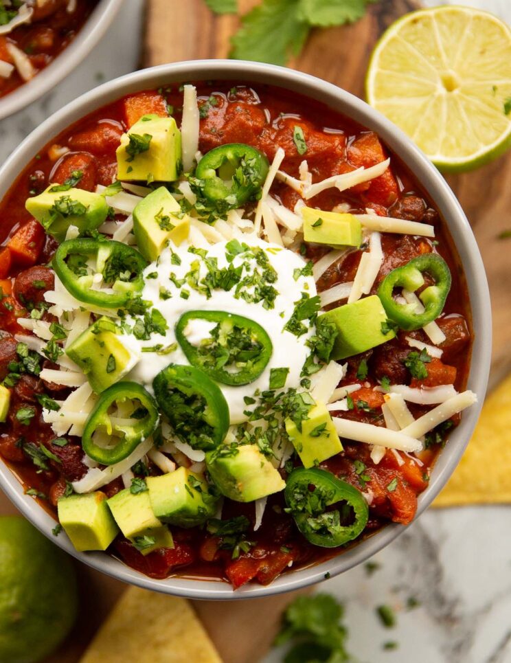 close up overhead shot of chilli in white bowl