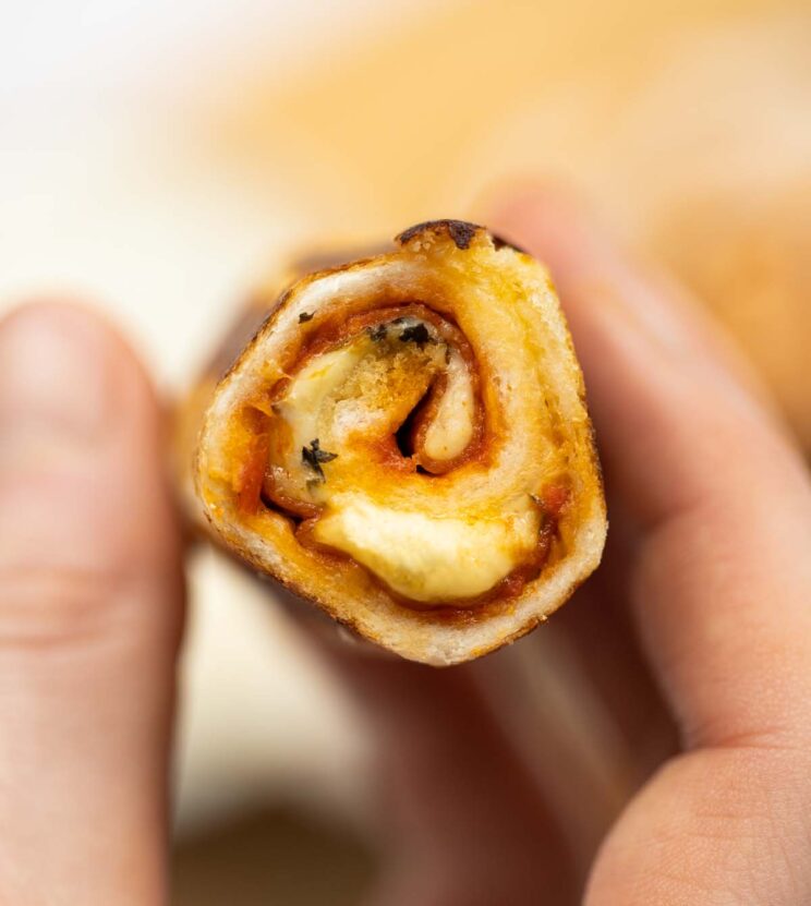 close up overhead shot of the inside of a pizza roll