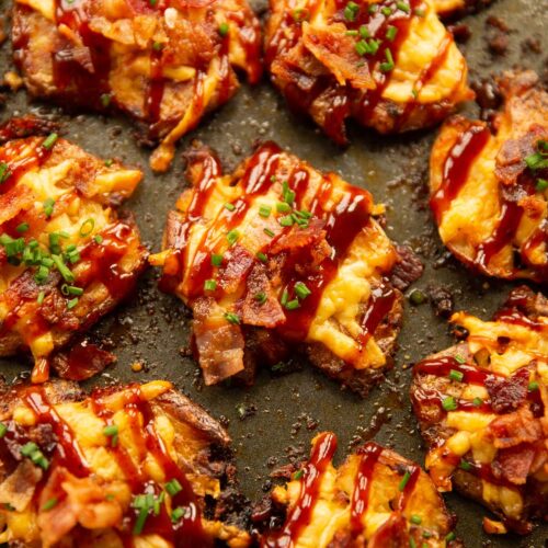 close up overhead shot of hunters smashed potatoes on baking tray