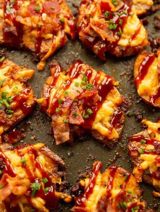 close up overhead shot of hunters smashed potatoes on baking tray