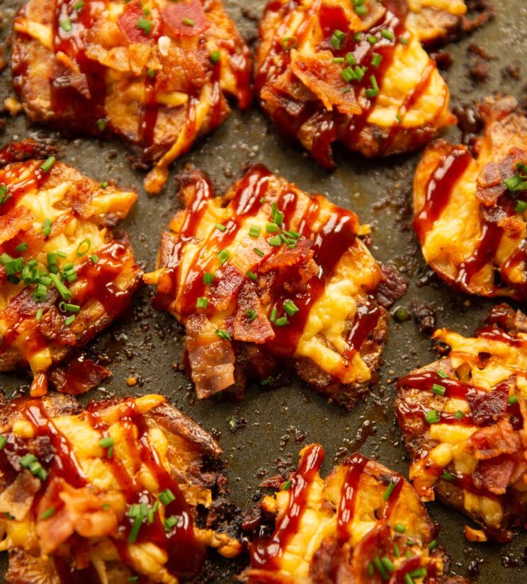 close up overhead shot of hunters smashed potatoes on baking tray