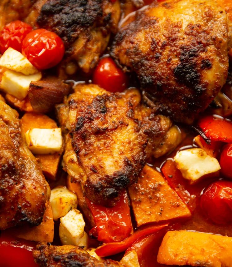 close up shot of Nando's chicken tray bake fresh out the oven