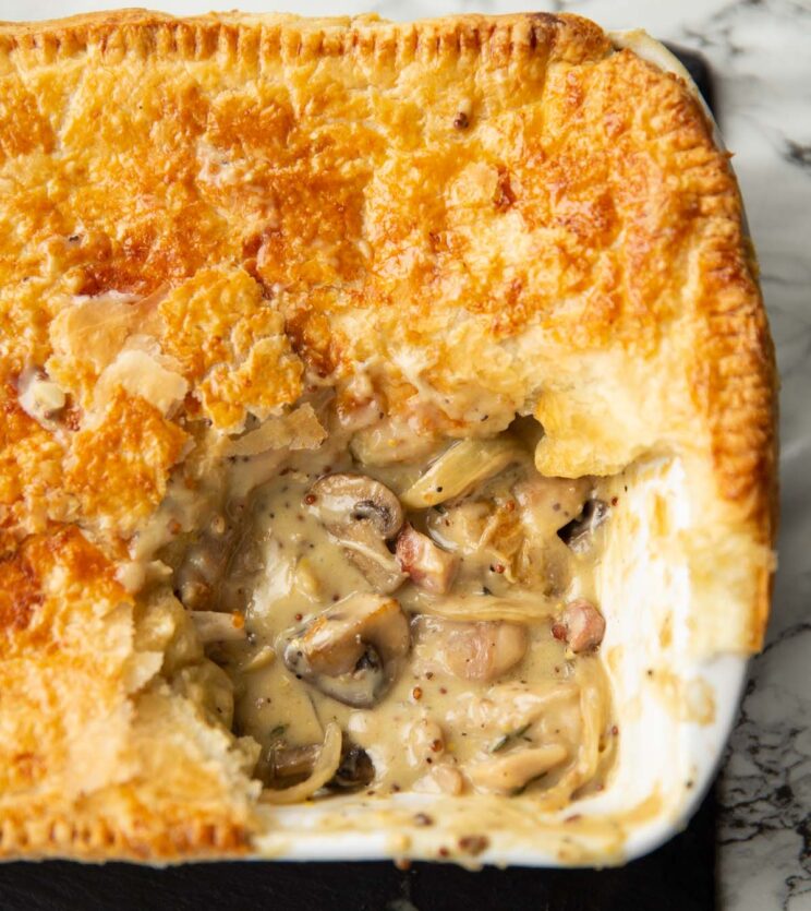 chicken mushroom pie fresh out the oven showing filling