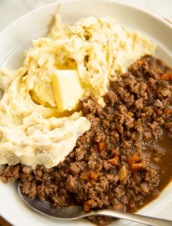 mince and tatties served in large white bowl with silver spoon