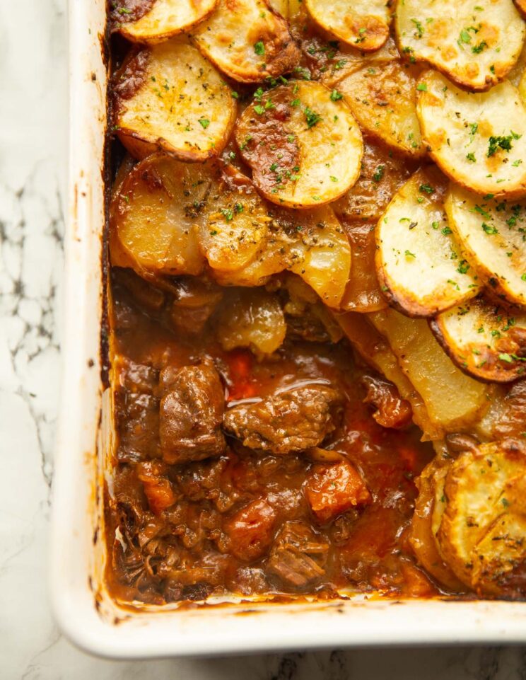 close up shot of steak and potato pie showing filling